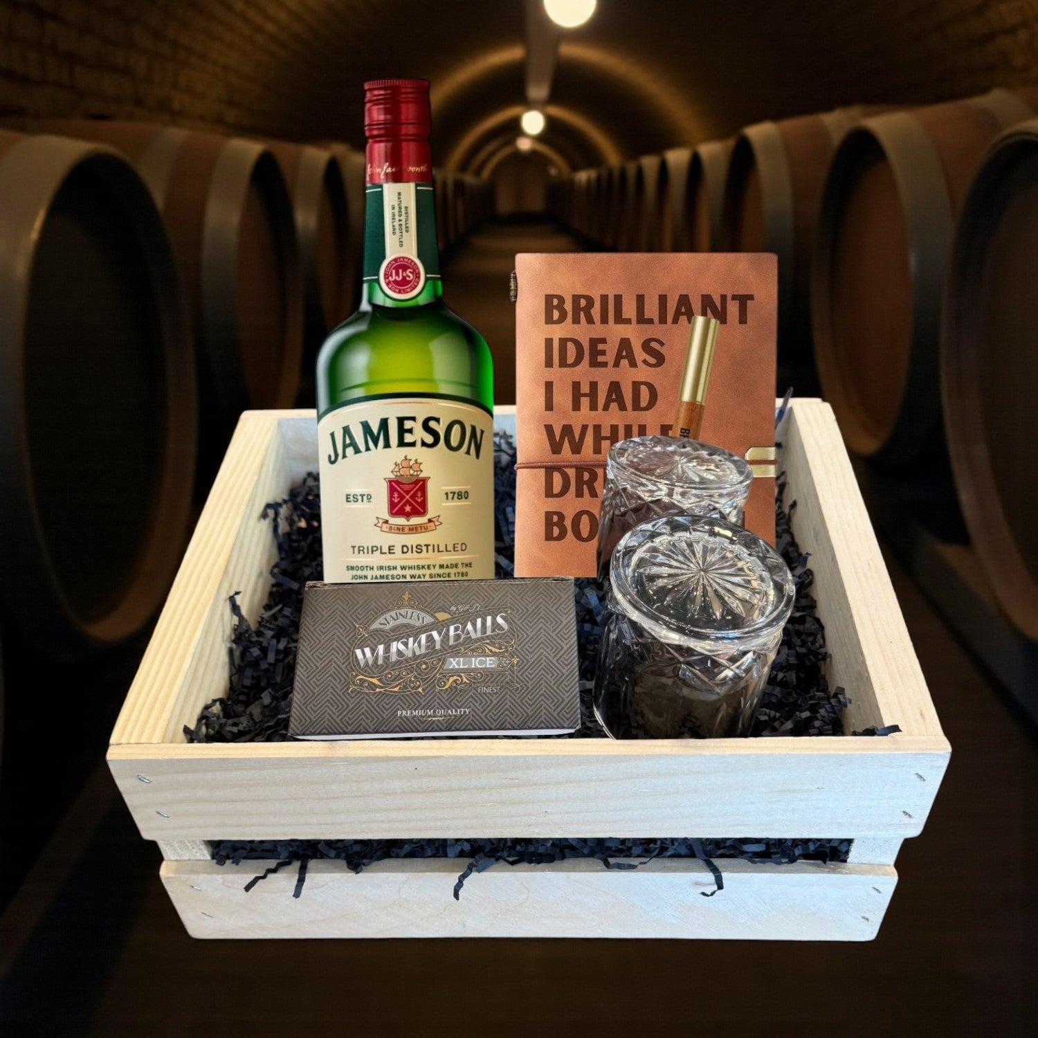 Jameson Irish Whiskey Gift Crate featuring whiskey bottle, crystal glasses, and journal displayed in a handcrafted wooden crate – exclusive Irish whiskey presentation from Rare Bourbon Shop