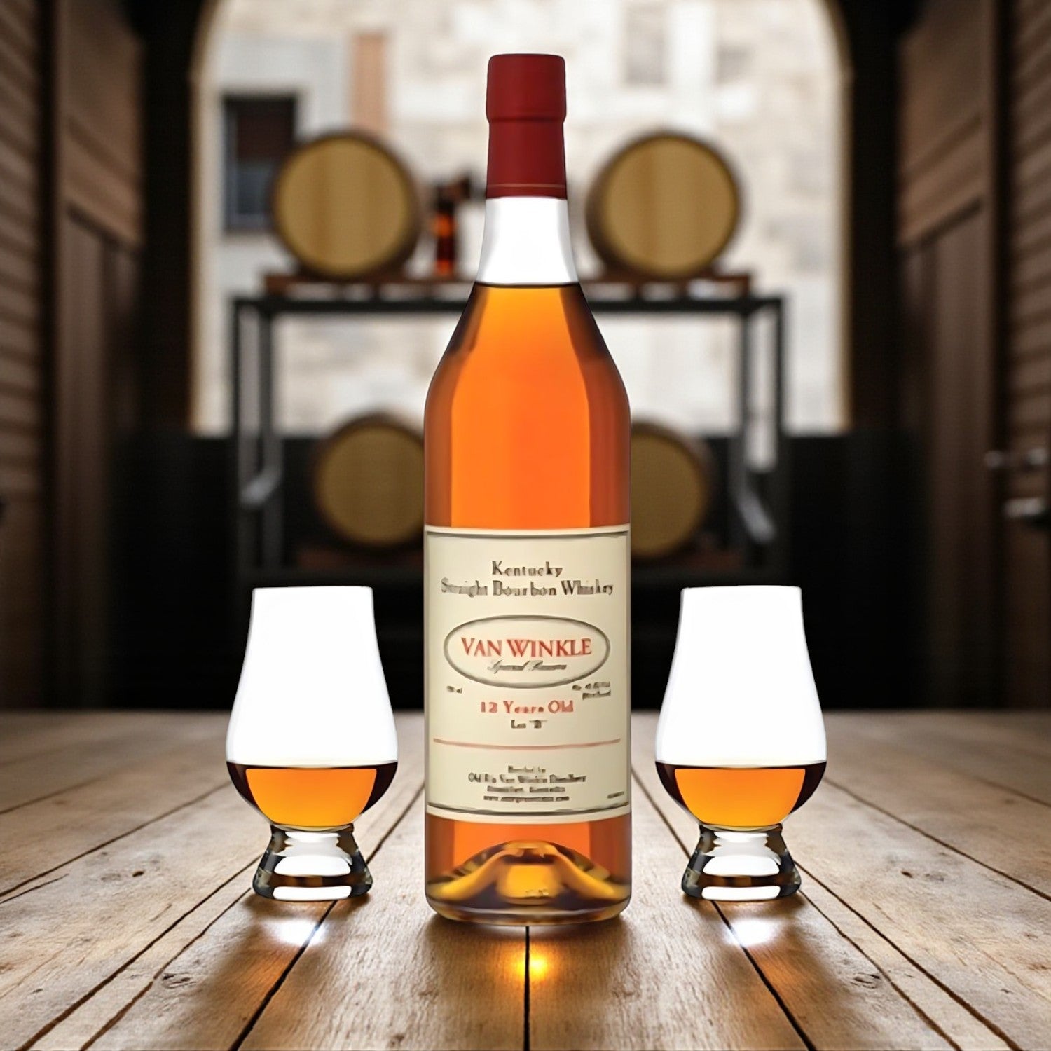 Collector’s Pappy Van Winkle Special Reserve 12 Year Lot B Bourbon Gift Set with two Glencairn glasses on wooden barrel table in bourbon warehouse – Rare Bourbon Shop lifestyle photo