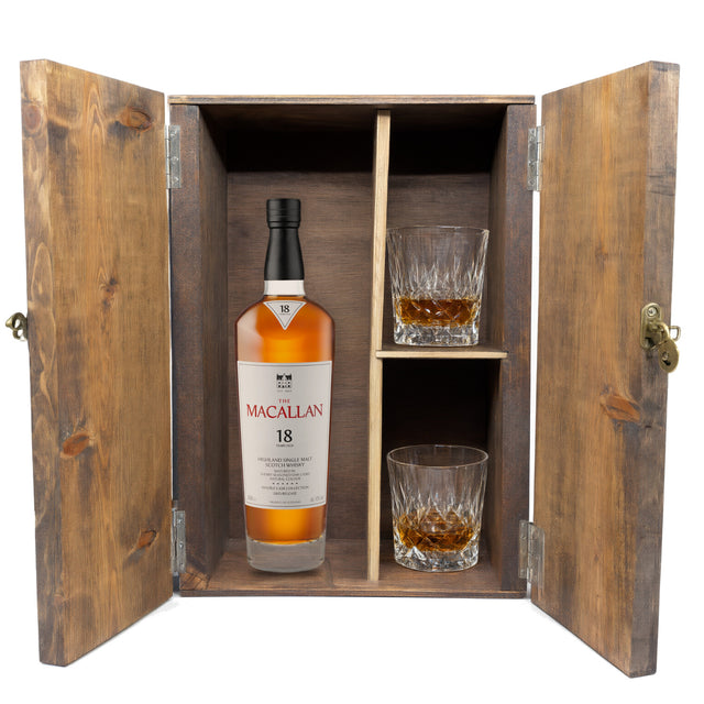 The Macallan 18 Year Double Cask in a fitted wooden gift box with two crystal old-fashioned glasses, studio white