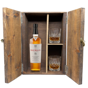 The Macallan 15 Year Double Cask in a fitted wooden gift box with two crystal old-fashioned glasses, studio white