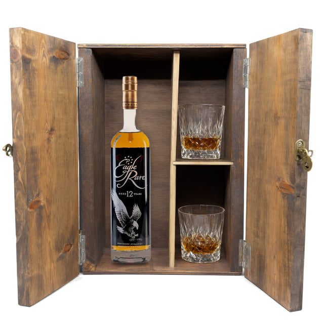 Eagle Rare 12 Year in a fitted wooden gift box with two crystal old-fashioned glasses, studio white