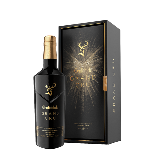 Glenfiddich Grand Cru 23 Year Old luxury Scotch bottle and collector box on black background