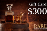 Gift card for $300 from Rare Bourbon Shop with a decanter and glass on a wooden barrel.