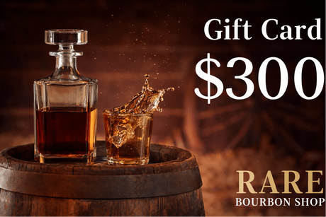 Gift card for $300 from Rare Bourbon Shop with a decanter and glass on a wooden barrel.