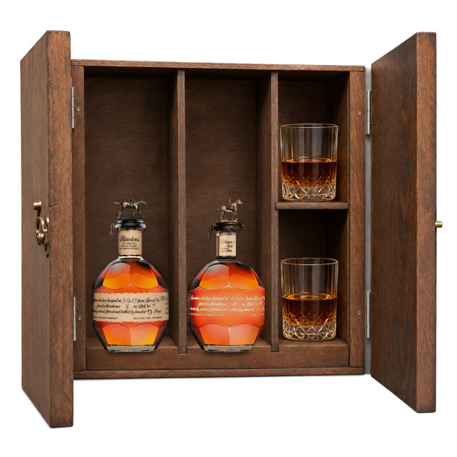 Blanton's Original Single Barrel & Blanton's Gold Edition in a wooden gift box with two crystal glasses on white