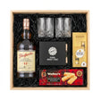 Glenfarclas 12 Year Sherry Cask Single Malt Scotch Whisky gift crate with crystal old fashioned glasses, whiskey stones, Ferrero Rocher chocolates, Walker's shortbread, and natural wood crate with black crinkle fill