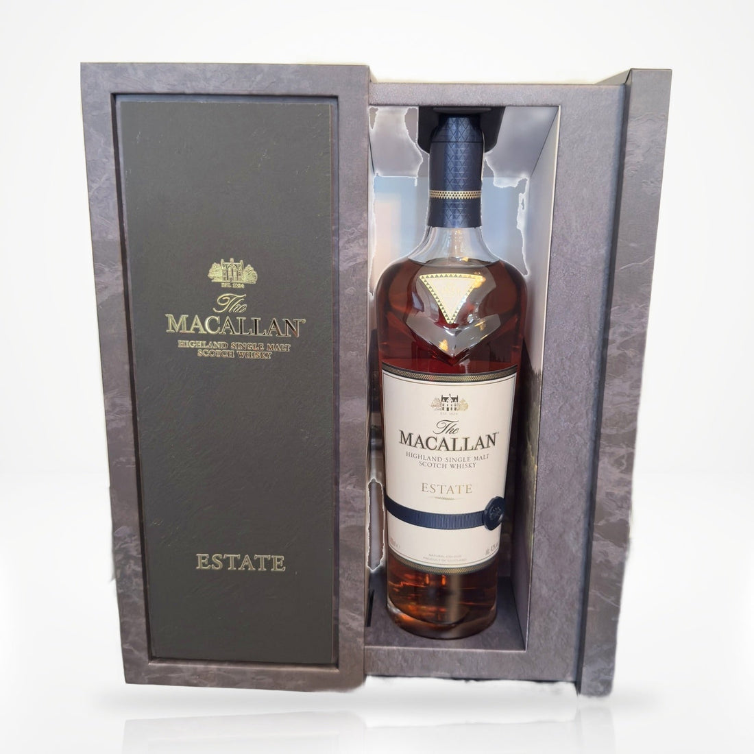 The Macallan Estate single malt Scotch whisky 750ml with presentation gift box on white studio background