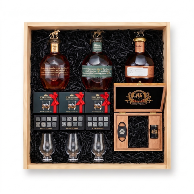 Blanton's Executive gift crate with three Blanton's bourbon editions, three Glencairn-style glasses, three whiskey stones sets, and a hand-finished wooden accessory box with a cutter and lighter, nested in a natural wood crate.