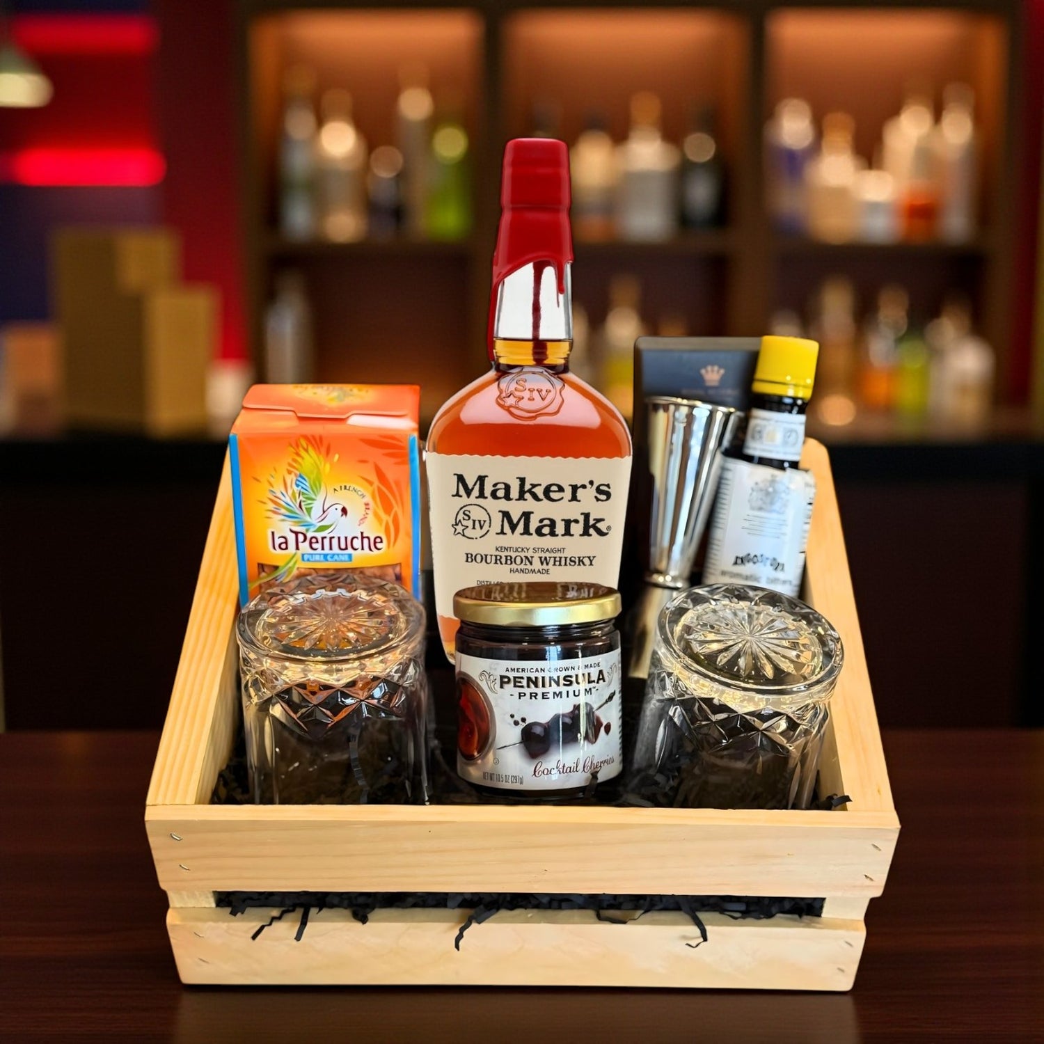 Collector’s Maker’s Mark Old Fashioned Gift Crate with bourbon, bitters, cherries, sugar cubes, and bar tools on bar table – Rare Bourbon Shop lifestyle photo