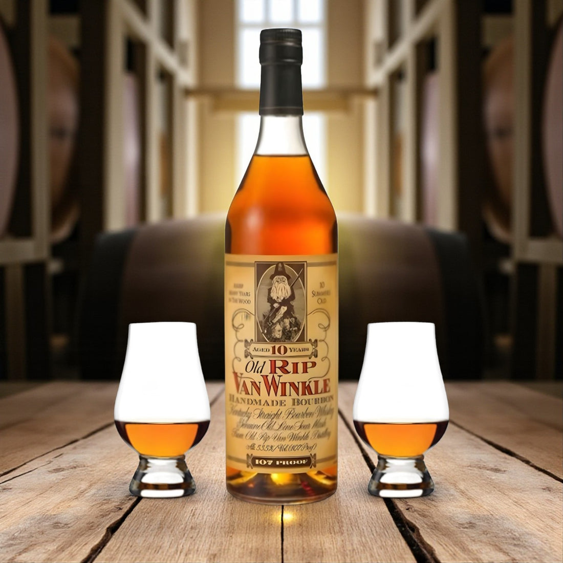 Collector’s Old Rip Van Winkle 10 Year Bourbon Gift Set with two Glencairn glasses on wooden table among bourbon barrels – Rare Bourbon Shop lifestyle photo