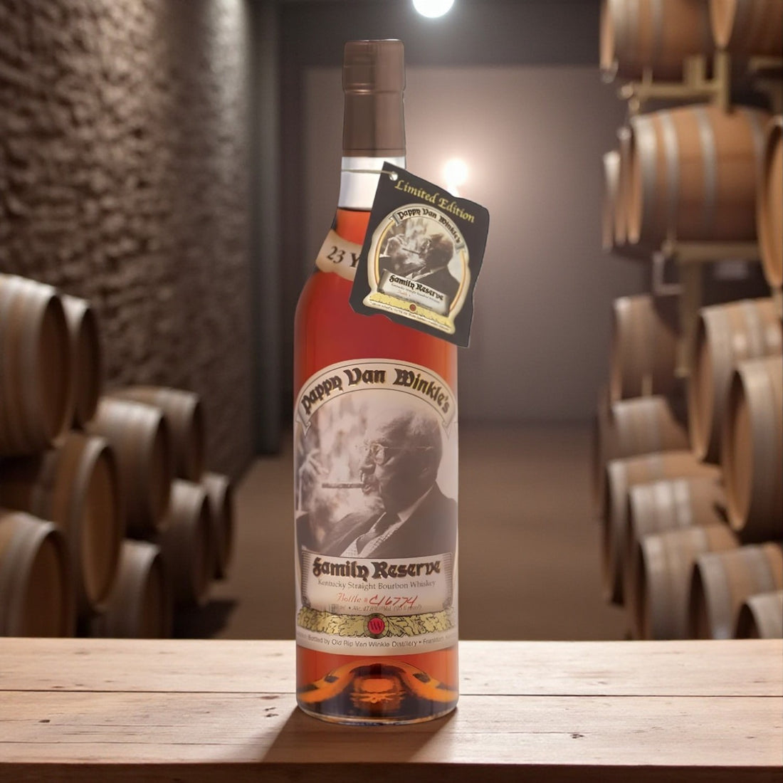 Collector’s Pappy Van Winkle Family Reserve 23 Year Bourbon bottle with Limited Edition tag on wooden table in bourbon barrel warehouse – Rare Bourbon Shop lifestyle photo